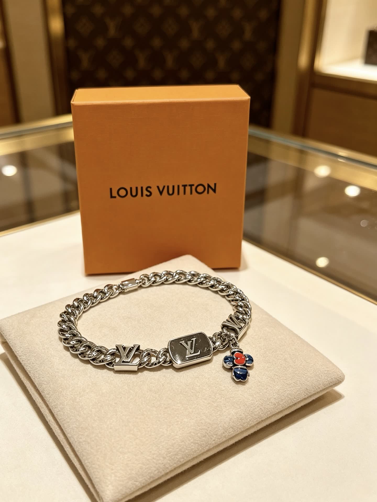 Louis Vuitton Silver Bracelet with Monogram Charms